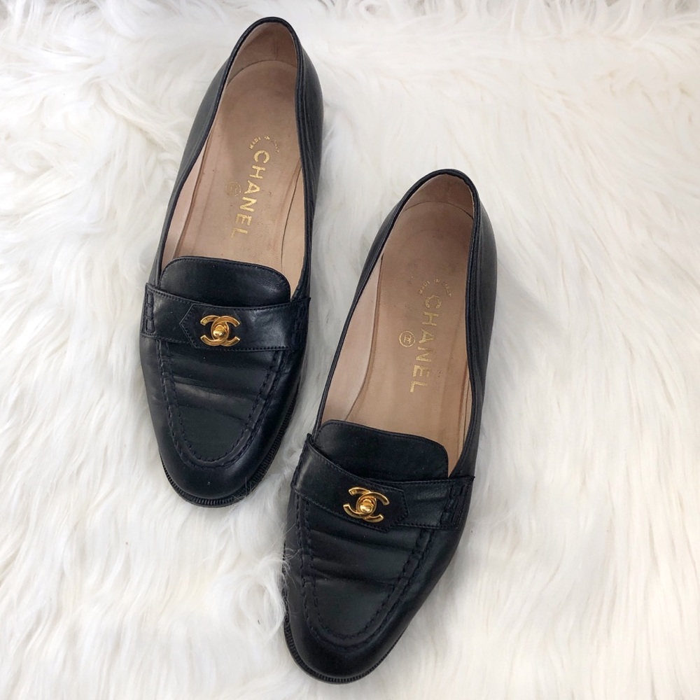CHANEL Black Leather Loafers with Gold Accents